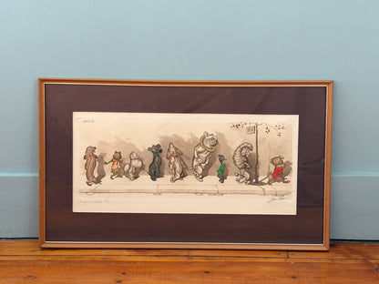 Framed illustration of cartoon dog characters on a wooden surface with a light blue wall background