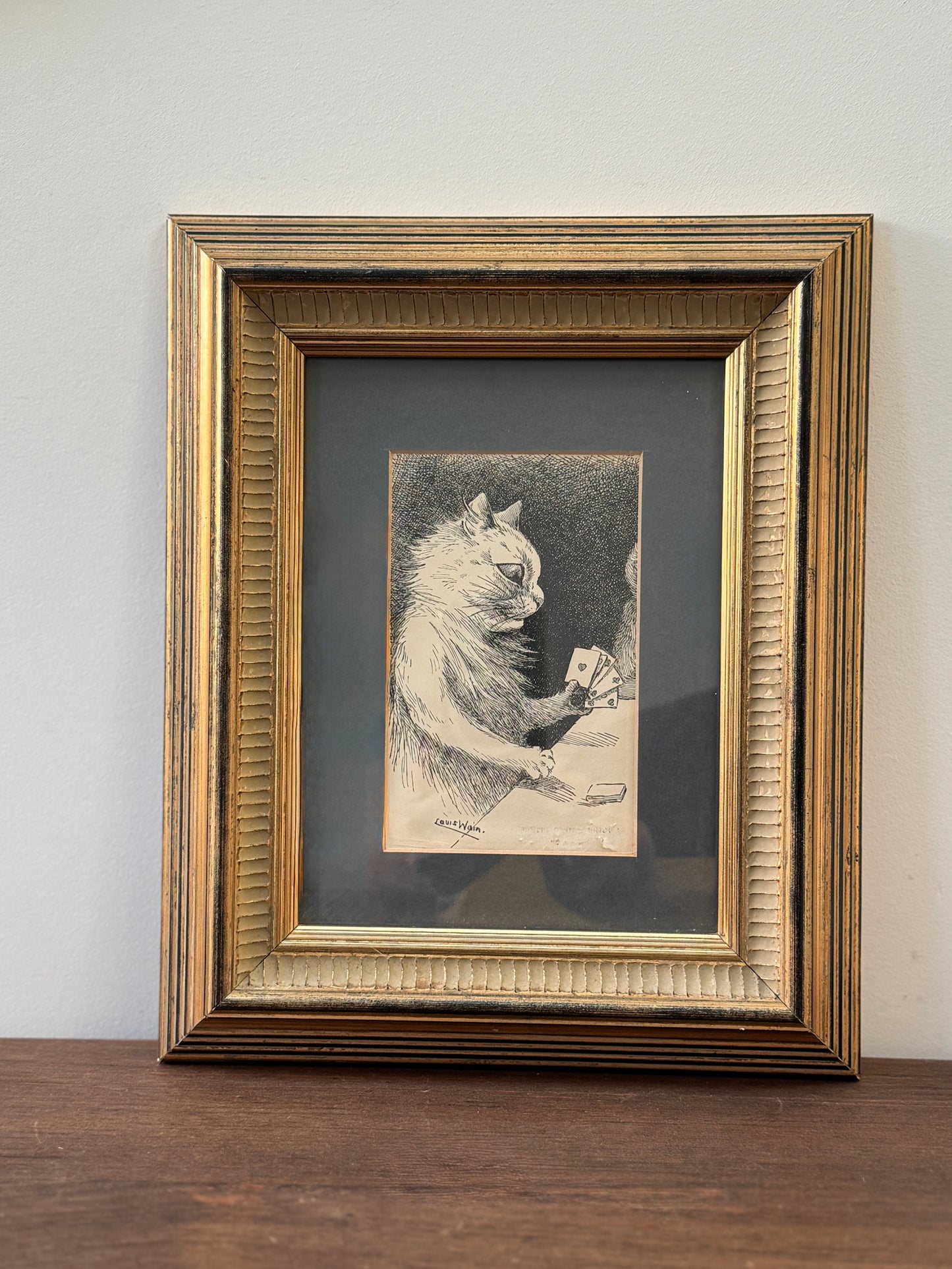 Framed print ‘Cat Playing Cards’ by Louis Wain | 1919