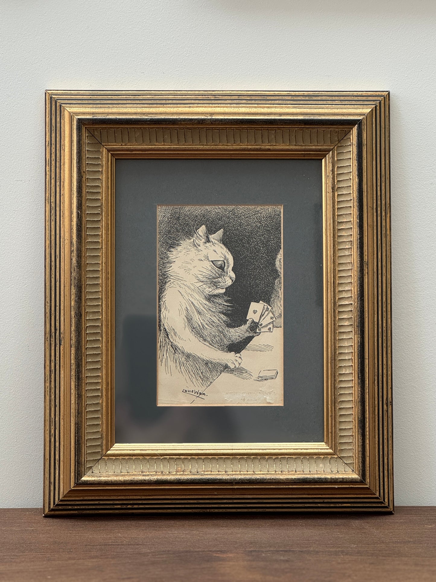 Framed print ‘Cat Playing Cards’ by Louis Wain | 1919