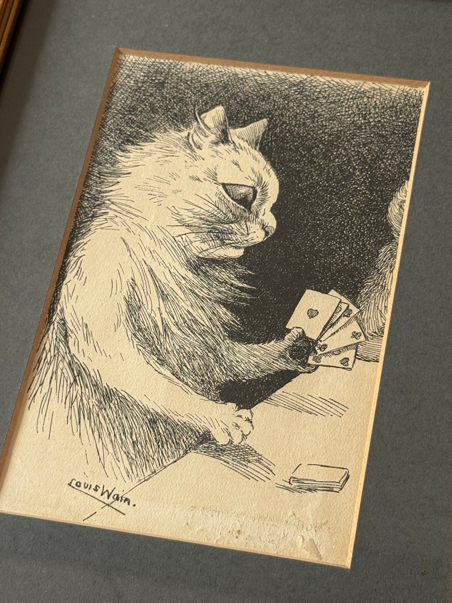 Framed print ‘Cat Playing Cards’ by Louis Wain | 1919