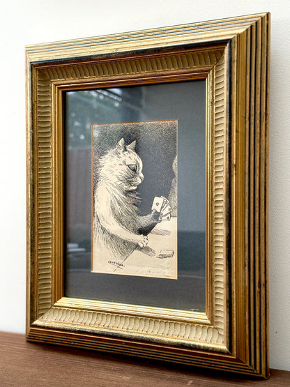 Framed print ‘Cat Playing Cards’ by Louis Wain | 1919
