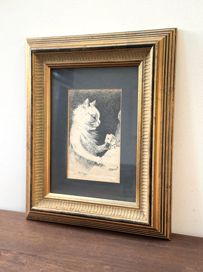 Framed print ‘Cat Playing Cards’ by Louis Wain | 1919