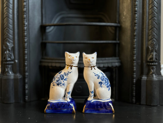 Pair_of_Vintage_Staffordshire_Cats_on_Blue_Cushions_with_Rare_Floral_Pattern_Blue_and_white