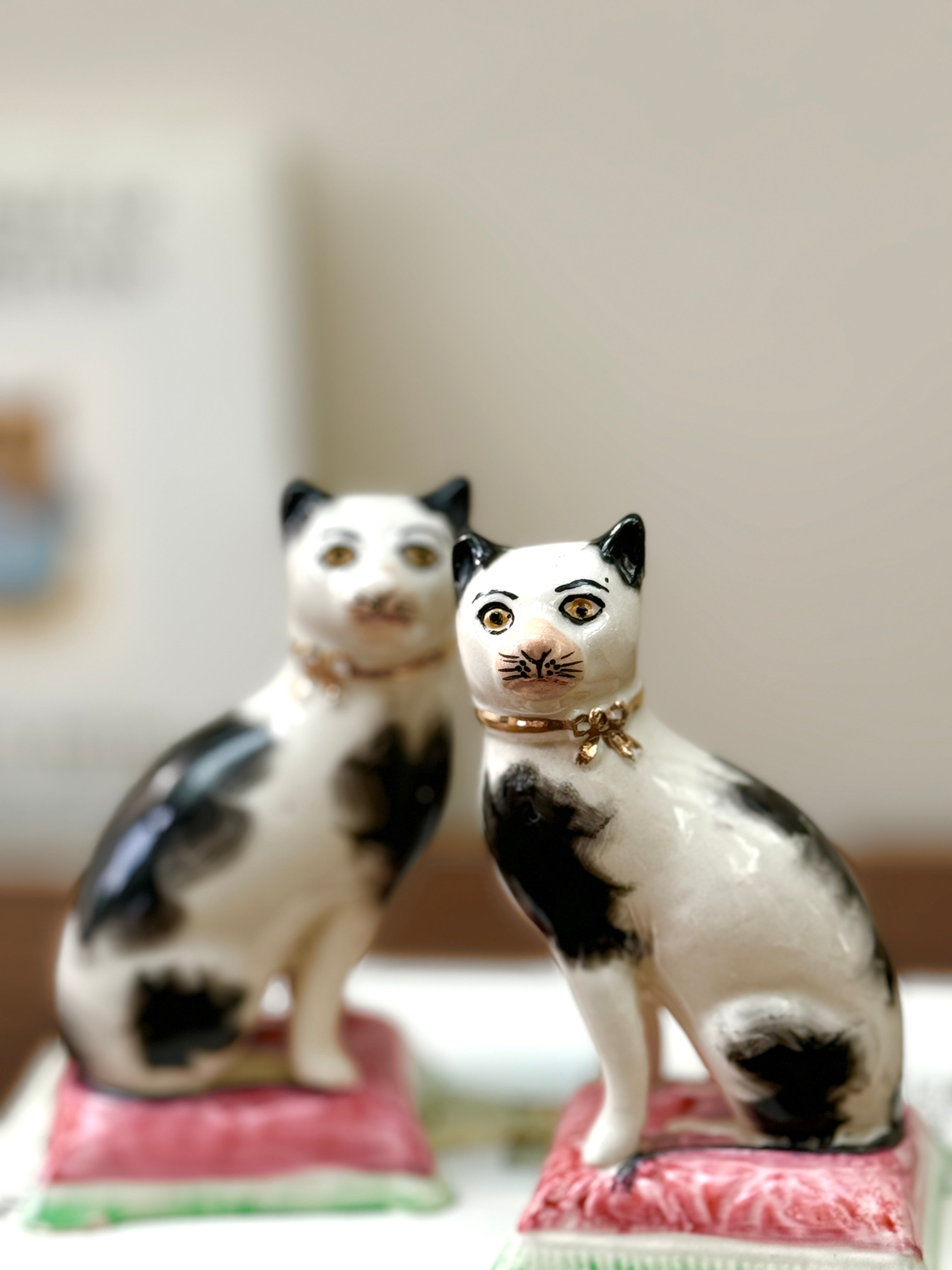 Staffordshire Porcelain kitties on sale